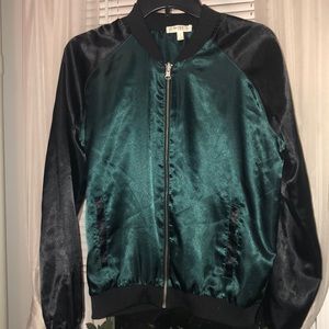 Emerald green bomber jacket.